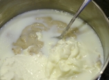 Dairy mixture in a saucepan