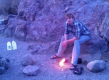Jeremy Weaver lighting his stove