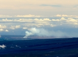 View of distant volcano eruption