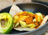 Scrambled eggs, chili, Tapatio, avocado wraps