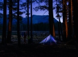Our campsite, bright moon, and fire glow