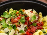 Tortellini with tomatoes, oregano, shaved Parmesan, capers, oliv