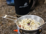 Hot oatmeal with coconut, cranberries, and seeds