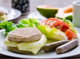 Egg muffin and vegetarian sausage breakfast