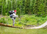 Crossing the Belly River suspension bridge