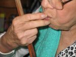 Grandma Eating a Fish Head